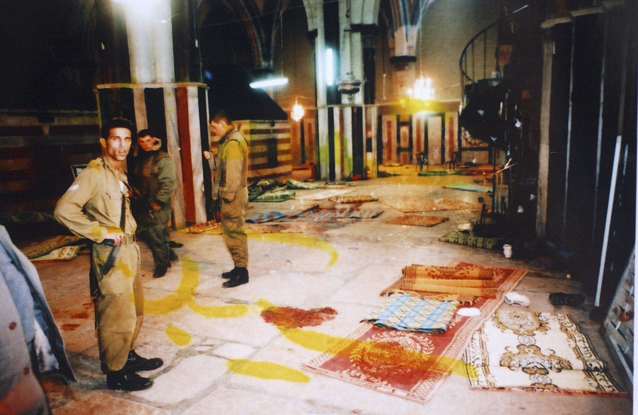 Israeli soldiers stand inside the Ibrahimi Mosque in Hebron after Baruch Goldstein massacred 29 Palestinian worshippers and wounded another 150 in a shooting attack, February 25, 1994.